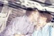 © Kalim - Young couple kissing in a restaurant