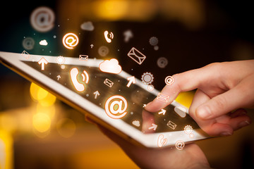 Hand touching tablet pc, social media concept
