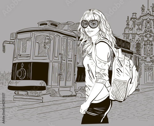Fototapeta na wymiar urban scene: fashion girl and old tram