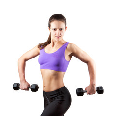 Sporty muscular woman with two dumbbells