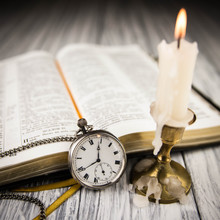 The Bible Opened And Pocket Watch