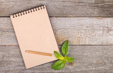 Wall Mural - Blank notepad on wooden table