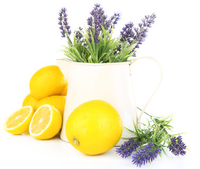 Wall Mural - Still life with fresh lemons and lavender, isolated on white