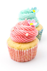 Vanilla cupcakes isolated white background