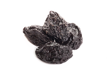 Prunes on a white background