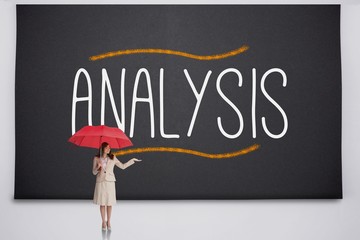 Wall Mural - Businesswoman holding umbrella against the word analysis