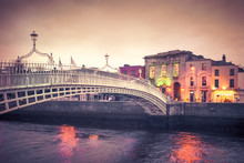 Vintage Style Historic Ha'penny Bridge, Dublin Ireland At Dusk