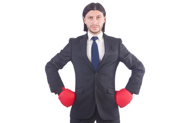 Businessman with boxing gloves on white