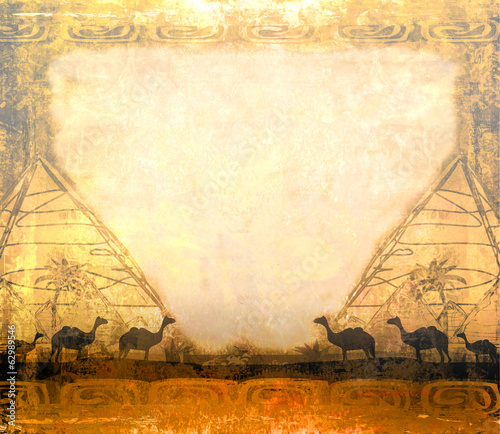 Fototapeta na wymiar camel caravan in wild africa - abstract grunge frame