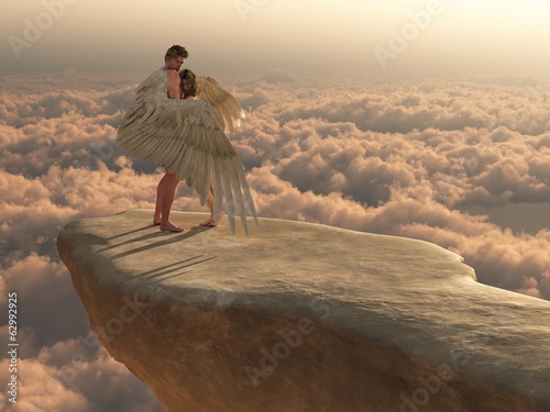 Obraz w ramie W ramionach anioła nad chmurami
