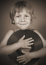 Boy With A Record Smiles