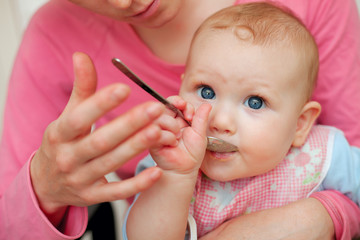 Mother feeding baby