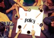 © WavebreakmediaMicro - Student sitting around page saying Policy