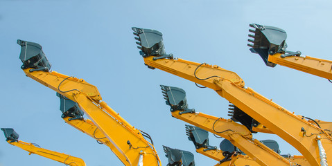 excavator bucket with blue sky.