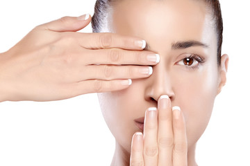 Wall Mural - beautiful spa girl with hands on her face. skincare concept