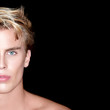 © Casther - Handsome blond man on Black Background