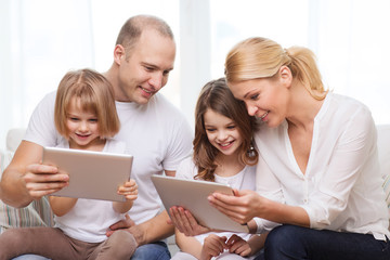 Wall Mural - family and two kids with tablet pc computers