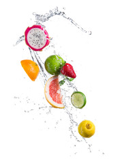 Poster - Pieces of exotic fruit in water splash