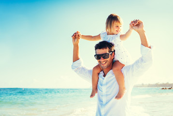 father and daughter at the beach