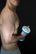 © Maria Vazquez - Muscular man with dumbbells