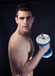 © Maria Vazquez - Muscular man with dumbbells