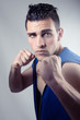 © Maria Vazquez - Muscular young man in boxing stance