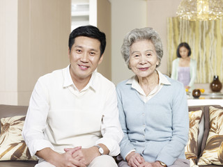 portrait senior mother and adult son