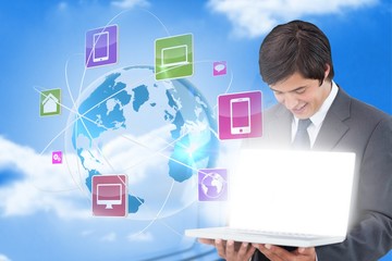 Aufkleber - Businessman showing laptop with app icons
