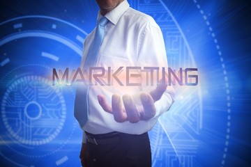 Poster - Businessman presenting the word marketing