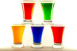 Pyramid from multi-colored alcohol shot glasses or colourful jelly