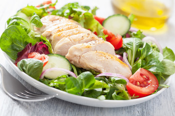 Canvas Print - chicken salad with tomatoes and cucumber