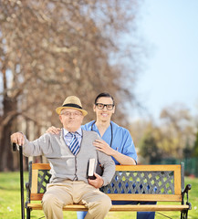 Poster - Healthcare professional and a senior posing in park