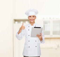 Canvas Print - smiling female chef with tablet pc computer