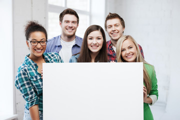 Wall Mural - group of students at school with blank board