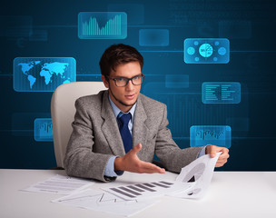 Wall Mural - Businessman doing paperwork with digital background