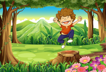 Wall Mural - A joyful boy at the jungle