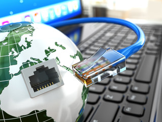 Poster - Internet concept. Laptop, earth and ethernet cable.