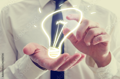 Fotografía Businessman with creative light bulb icon