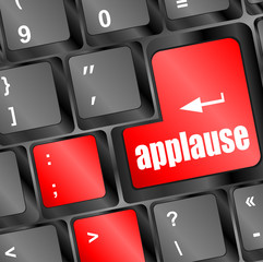 Poster - Computer keyboard with applause key - business concept
