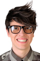 Wall Mural - Nerdy young man faking a smile, isolated closeup