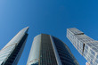 © sergeypankov - Skyscraper on the background of blue sky
