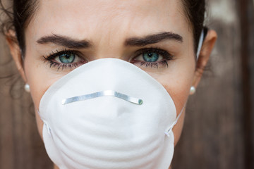 Close-up woman wearing a face mask