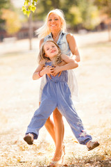 Mother and daughter in the nature