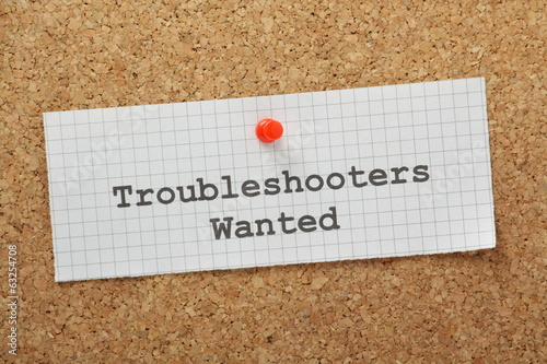 Fotografía Troubleshooters Wanted on a cork notice board
