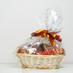 gift basket against grey background