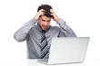 © pikselstock - Stressed man looking at laptop