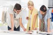 © WavebreakmediaMicro - Fashion designers discussing designs