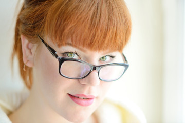 redhead  girl with glasses