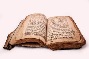 Old Quran Book OnThe White Background