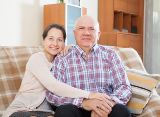 Wall Mural - mature couple in home interior